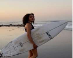 Swindell enjoys adventure sports like surfing in their free time.